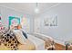 Comfortable bedroom with unique decor, complemented by hardwood floors and soft natural light, offering a peaceful retreat at 3930 West Marion St., Mullins, SC 29574