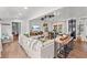 Bright and airy living room featuring a large sofa, stylish decor, and ample natural light at 3930 West Marion St., Mullins, SC 29574