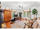 Spacious living room with hardwood floors, ample natural light, and comfortable seating, ideal for entertaining at 3930 West Marion St., Mullins, SC 29574