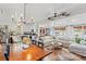 Spacious open-concept living area with wood floors, white walls, and a large sectional sofa at 3930 West Marion St., Mullins, SC 29574