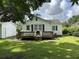 A large backyard deck that accents this charming home at 404 E Andrews St., Hemingway, SC 29554