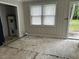 An adjacent room with large window and access to the water heater and rear porch at 404 E Andrews St., Hemingway, SC 29554