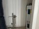 A view of the utility room where the hot water heater is stored at 404 E Andrews St., Hemingway, SC 29554