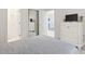 Bright bedroom with a mirrored closet, featuring a dresser, television, and connecting rooms at 4261 Hibiscus Dr. # 4-104, Little River, SC 29566