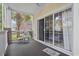 Relaxing outdoor patio with a sliding glass door, exterior views, and patio furniture at 4261 Hibiscus Dr. # 4-104, Little River, SC 29566