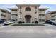 Beautiful tan condominium with multiple balconies and covered entrance at 4290 Pinehurst Circle # B3, Little River, SC 29566