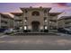 Exterior view of the building featuring assigned parking, landscaped grounds and a welcoming facade at 4290 Pinehurst Circle # B3, Little River, SC 29566