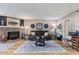 Cozy living room featuring a brick fireplace and stylish decor at 4290 Pinehurst Circle # B3, Little River, SC 29566