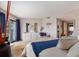 Well-lit main bedroom with a dresser, sitting area, and sliding glass doors to a patio at 4290 Pinehurst Circle # B3, Little River, SC 29566