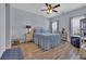 Inviting bedroom featuring a ceiling fan, comfy furniture, and wood-look flooring at 4520 Lighthouse Dr. # 29B, Little River, SC 29566