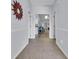 Bright hallway featuring tile floors and easy access to the kitchen and living areas at 4520 Lighthouse Dr. # 29B, Little River, SC 29566