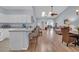 Open-concept living space with skylights, breakfast bar, and seamless flow into the living room at 4520 Lighthouse Dr. # 29B, Little River, SC 29566