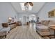 Spacious living area with skylights, ceiling fan, and stylish furnishings create a cozy atmosphere at 4520 Lighthouse Dr. # 29B, Little River, SC 29566