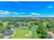 Stunning aerial view of the golf course community with lush greenery and scenic water features at 4532 Spyglass Dr., Little River, SC 29566