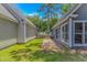 Backyard with green grass, patio, fenced perimeter, and access to both houses at 4532 Spyglass Dr., Little River, SC 29566
