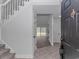 Inviting foyer featuring tile flooring, staircase, and an open layout at 4532 Spyglass Dr., Little River, SC 29566