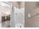 Clean bathroom with a walk-in shower featuring a white tile surround and gold fixtures at 4655 Wild Iris Dr. # 41-303, Myrtle Beach, SC 29577