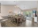 Open floor plan with a dining area, living room, and balcony with a view of the outdoors at 4655 Wild Iris Dr. # 41-303, Myrtle Beach, SC 29577