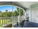 Inviting screened-in porch with comfortable seating, perfect for enjoying the landscape at 4655 Wild Iris Dr. # 41-303, Myrtle Beach, SC 29577