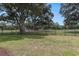Well-maintained backyard featuring a lush lawn and a black metal fence surrounding the property at 503 N 20Th Ave. N # 41D, North Myrtle Beach, SC 29582