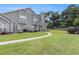 Condo with a lawn, bordered by a fence, features a patio area with outdoor furniture at 503 N 20Th Ave. N # 41D, North Myrtle Beach, SC 29582