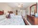 Well-lit bedroom featuring two beds, nautical themed bedding, and ensuite bathroom and walk-in closet at 503 N 20Th Ave. N # 41D, North Myrtle Beach, SC 29582