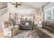 Open-concept living room with hardwood floors, a vaulted ceiling, and open access to the kitchen at 503 N 20Th Ave. N # 41D, North Myrtle Beach, SC 29582
