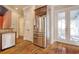 Kitchen with stainless steel appliances, granite countertops, and access to an outdoor deck at 55 Pineberry Dr., Georgetown, SC 29440