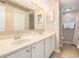 Bright bathroom features double sinks, vanity lighting, and plenty of counter space at 5505 N Ocean Blvd. # 303, Myrtle Beach, SC 29577