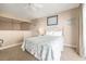 Cozy bedroom with a beach-themed bedspread, soft lighting and serene atmosphere at 5505 N Ocean Blvd. # 303, Myrtle Beach, SC 29577
