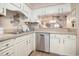 Well-equipped kitchen with stainless steel dishwasher and plenty of cabinet space at 5505 N Ocean Blvd. # 303, Myrtle Beach, SC 29577