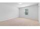 Cozy bedroom with natural light, neutral carpet, and a serene atmosphere at 597 Heritage Downs Dr., Conway, SC 29526