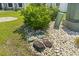 The property features well-maintained landscaping, with rocks and greenery at 597 Heritage Downs Dr., Conway, SC 29526