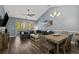 Bright living area with wood flooring, modern decor, and sliding glass doors at 6015 Catalina Dr. # 932, North Myrtle Beach, SC 29582