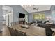 Inviting living space featuring a dining table, TV, and comfortable seating area at 6015 Catalina Dr. # 932, North Myrtle Beach, SC 29582