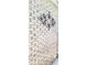 Close up of white brick exterior with a wall ornament adding a decorative touch at 610 Hibiscus Ave. # 610, Myrtle Beach, SC 29572