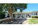 Charming one-story home with a welcoming front porch and a beautiful mature tree in the front yard at 610 Hibiscus Ave. # 610, Myrtle Beach, SC 29572