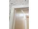 Hallway and doorway are accented by crown molding and stylish wall paper at 610 Hibiscus Ave. # 610, Myrtle Beach, SC 29572