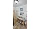 Kitchenette features wainscotting, patterned wallpaper, and a wooden storage table at 610 Hibiscus Ave. # 610, Myrtle Beach, SC 29572