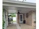 Covered porch with brick features and concrete flooring at 610 Hibiscus Ave. # 610, Myrtle Beach, SC 29572