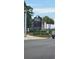 Entrance to The Market Common with a directory of shops and restaurants at 610 Hibiscus Ave. # 610, Myrtle Beach, SC 29572
