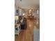 Open-concept living and dining area with hardwood floors, natural light, and cozy furnishings at 610 Hibiscus Ave. # 610, Myrtle Beach, SC 29577