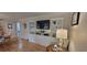 Cozy living room with hardwood floors, custom built-ins, and natural light at 610 Hibiscus Ave. # 610, Myrtle Beach, SC 29577