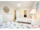 Bright bedroom with a dresser, closet, and a calming atmosphere featuring stylish nautical bedding at 6172 Catalina Dr. # 414H, North Myrtle Beach, SC 29582