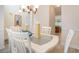 Bright dining area features a glass-topped table with seating for six at 6172 Catalina Dr. # 414H, North Myrtle Beach, SC 29582