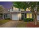Charming two-story home featuring a balcony, garage, and well-maintained landscaping at 6172 Catalina Dr. # 414H, North Myrtle Beach, SC 29582