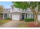 Charming two-story home featuring a balcony, garage, and well-maintained landscaping at 6172 Catalina Dr. # 414H, North Myrtle Beach, SC 29582