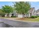 Street view of attractive homes with garages, landscaping, and inviting curb appeal at 6172 Catalina Dr. # 414H, North Myrtle Beach, SC 29582