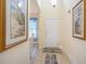 Bright foyer with tile flooring, artwork, and a view into the dining area at 6172 Catalina Dr. # 414H, North Myrtle Beach, SC 29582