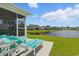 Backyard featuring a serene pond and patio furniture at 668 Rycola Circle, Surfside Beach, SC 29575
